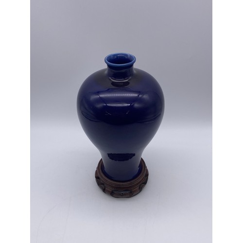 523 - CHINESE MONOCHROME PLUM GLAZE MEIPING VASE ON HARDWOOD STAND