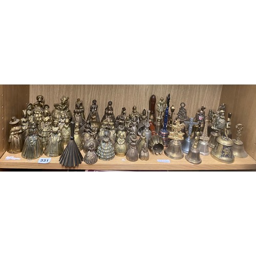 331 - SHELF OF DECORATIVE BRASS FIGURAL BELLS