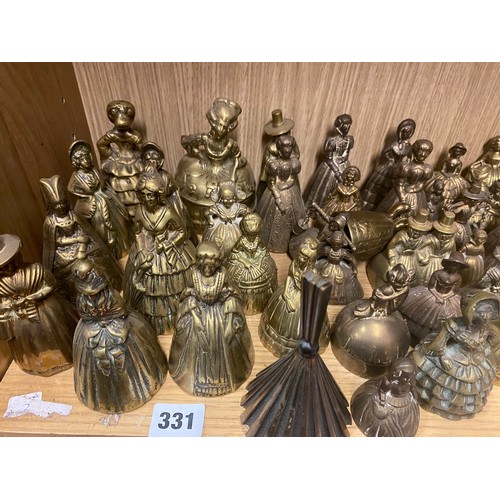 331 - SHELF OF DECORATIVE BRASS FIGURAL BELLS