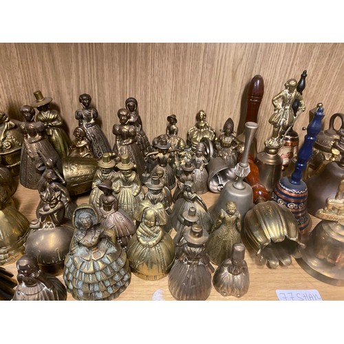 331 - SHELF OF DECORATIVE BRASS FIGURAL BELLS