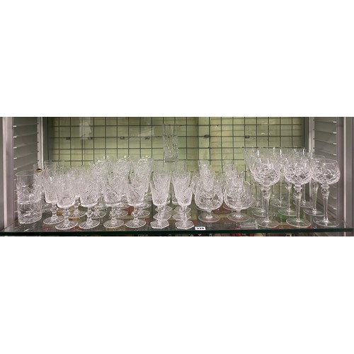 339 - SHELF OF CUT AND ETCHED SETS OF DRINKING GLASSES