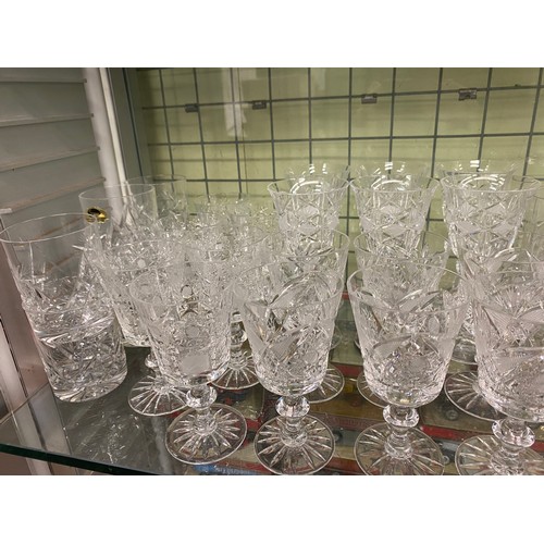 339 - SHELF OF CUT AND ETCHED SETS OF DRINKING GLASSES