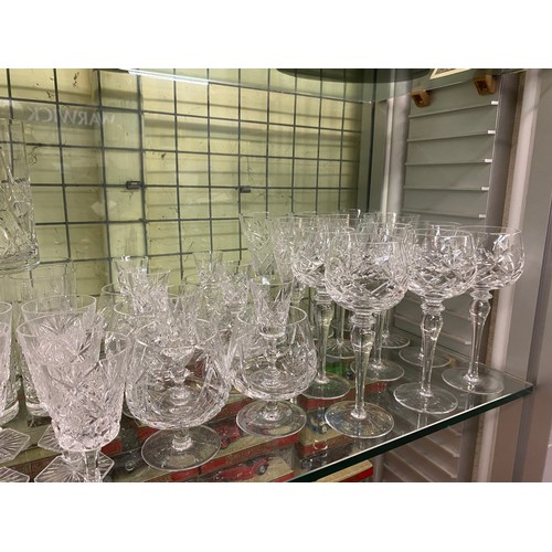 339 - SHELF OF CUT AND ETCHED SETS OF DRINKING GLASSES