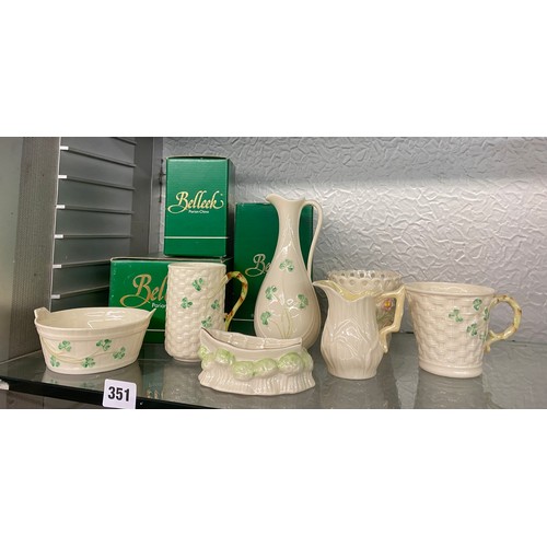 351 - IRISH BELLEEK CREAMWARE PORCELAIN JUGS, EWER VASE, AND PLANTER, SOME WITH BOXES