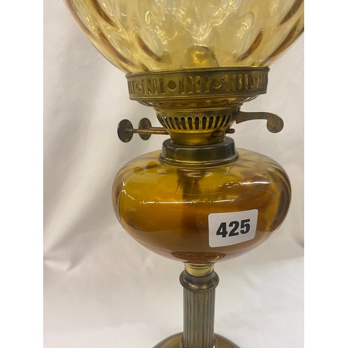 425 - AMBER GLASS AND BRASS OIL LAMP WITH DIMPLED SHADE