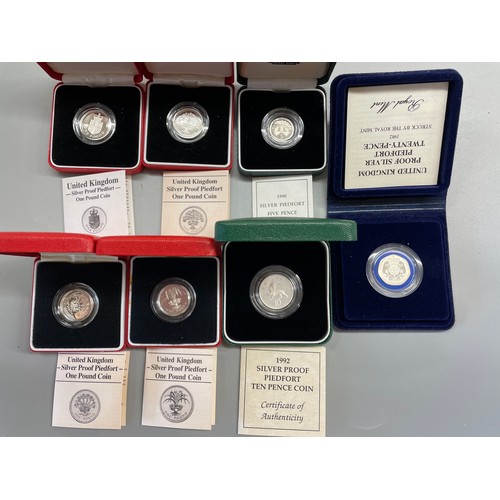 584 - UNITED KINGDOM PROOF SILVER PIED FORT 20 PENCE PIECE, 1990 FIVE PENCE COIN, 1992 10 PENCE COIN, AND ... 