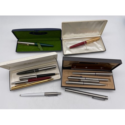 561 - THREE CASED PARKER PEN SETS, SHEAFFER PENS, AND OTHERS