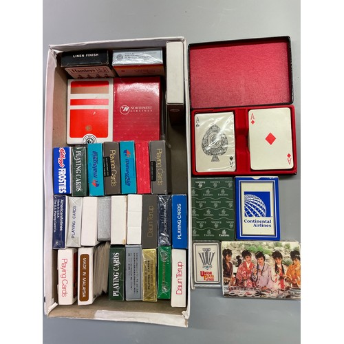 554 - SHOE BOX OF VARIOUS PACKETS OF PLAYING CARDS