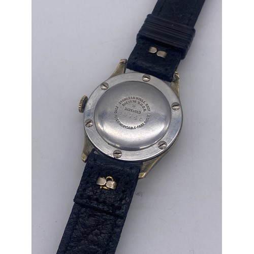 573 - GENTLEMAN’S PIERCE 17 JEWEL WRISTWATCH ON LEATHER STRAP