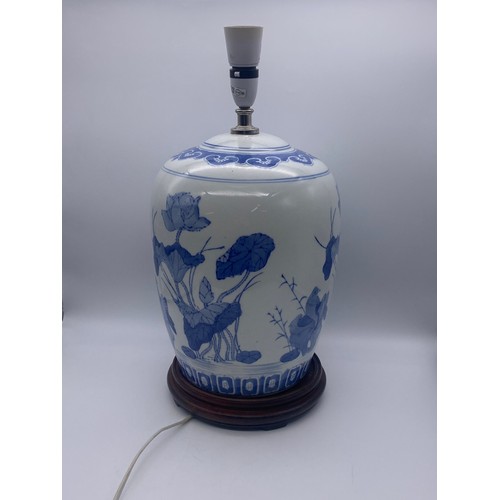 509 - CHINESE BLUE AND WHITE DECORATED OVOID TABLE LAMP ON HARDWOOD BASE