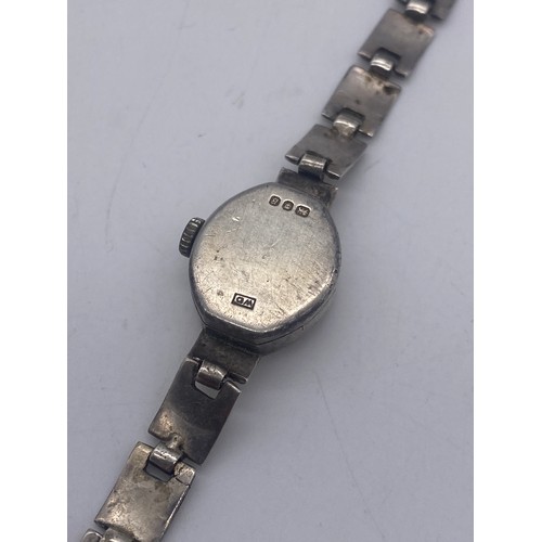 581 - SILVER CASED BARK EFFECT AVIA WRIST WATCH