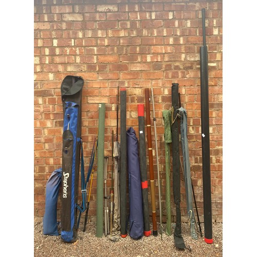 394 - SLECTION OF FISHING RODS, POLES, AND ROD HOLDALL