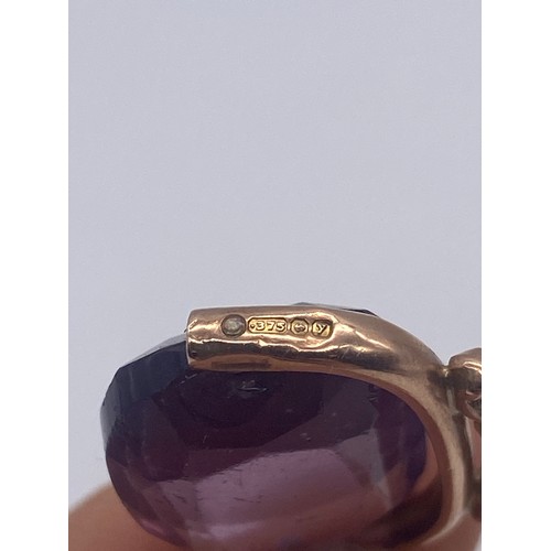 571 - 9CT ROSE GOLD MOUNTED AMETHYST SWIVEL FOB