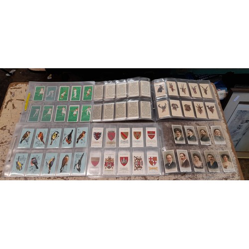 615 - PERSPEX SLEEVES OF VARIOUS CIGARETTE CARDS AND PART SETS