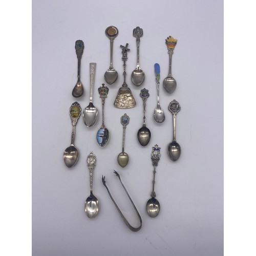 579 - BAG OF NOVELTY ENAMEL FINIAL TEASPOONS AND SUGAR TONGS (SOME SILVER)