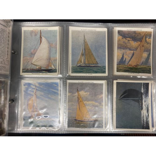 602 - BINDER OF JOHN PLAYER AND SONS CIGARETTE OVERSIZED CARDS AND ALBUM OF INCOMPLETE SETS