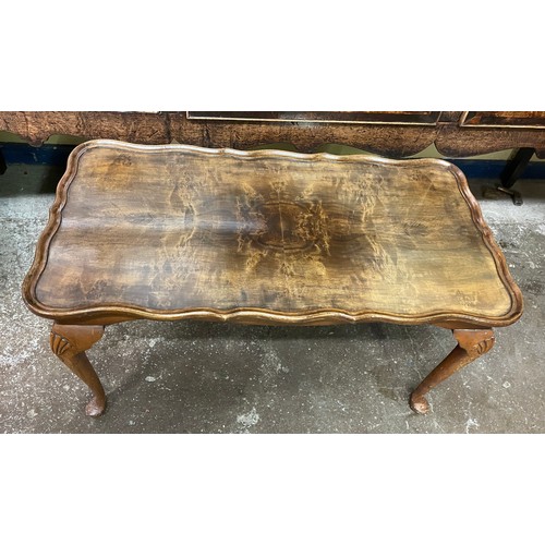 204 - WALNUT SERPENTINE OBLONG COFFEE TABLE