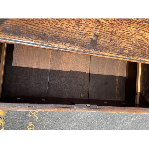 211 - MID 18TH CENTURY OAK DRESSER BASE FITTED WITH THREE CROSS BANDED DRAWERS WITH A  SHAPED APRON ON CAB... 