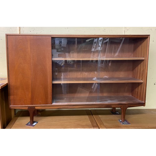 38 - MCINTOSH TEAK DWARF BOOKCASE WITH SLIDING GLASS DOORS