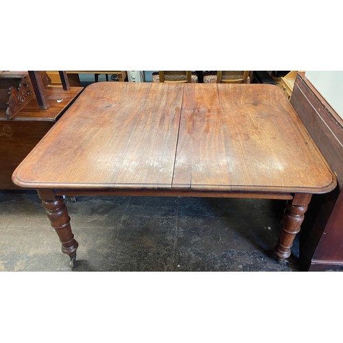 80 - VICTORIAN MAHOGANY EXTENDING DINING TABLE WITH ROUNDED MOULDED EDGE ON TAPERED RING TURNED LEGS WITH... 