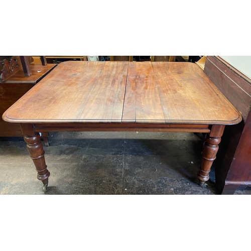 80 - VICTORIAN MAHOGANY EXTENDING DINING TABLE WITH ROUNDED MOULDED EDGE ON TAPERED RING TURNED LEGS WITH... 