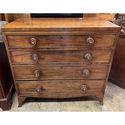 91 - EARLY 19TH CENTURY MAHOGANY FOUR DRAWER CHEST ON PLAY BRACKET FEET WITH TURNED WOODEN HANDLES L100CM... 