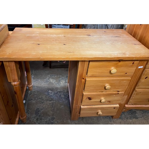 112 - PINE FOUR DRAWER KNEEHOLE DRESSING TABLE