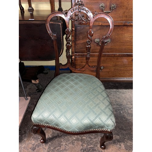 199 - LATE VICTORIAN MAHOGANY CARVED GREEN UPHOLSTERED NURSING CHAIR