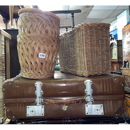 214 - A VINTAGE SUITCASE AND CANE AND WICKERWARE BASKETS