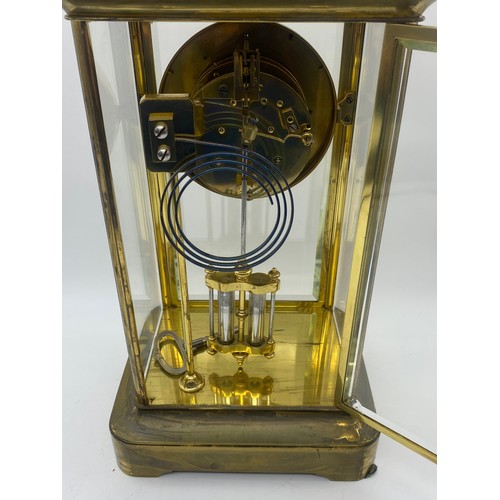 544 - LAQUERED BRASS FOUR PANE CLOCK WITH DOUBLE MERCURY PENDULUM AND KEY BY BARRAUD AND LUNDS LONDON 4901