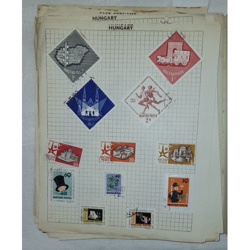 558 - STRAND POSTAGE STAMP ALBUM OF WORLD STAMPS