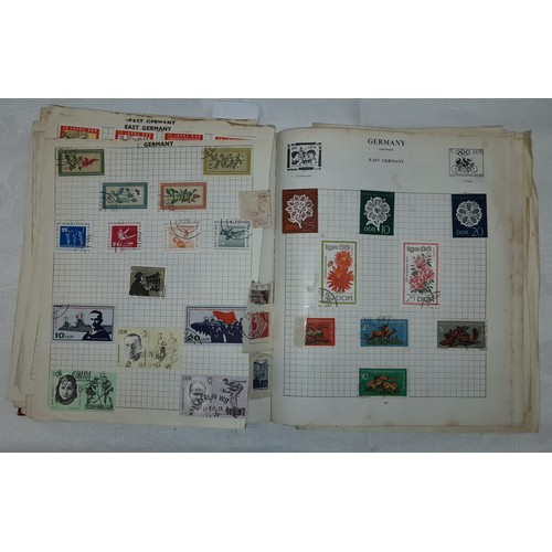 558 - STRAND POSTAGE STAMP ALBUM OF WORLD STAMPS