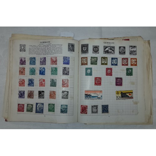 558 - STRAND POSTAGE STAMP ALBUM OF WORLD STAMPS