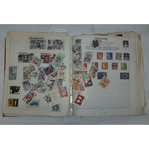 558 - STRAND POSTAGE STAMP ALBUM OF WORLD STAMPS