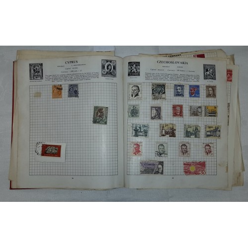 558 - STRAND POSTAGE STAMP ALBUM OF WORLD STAMPS