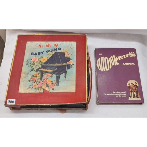 559 - TOY BABY PIANO AND THE MONKEES MUSIC ANNUAL