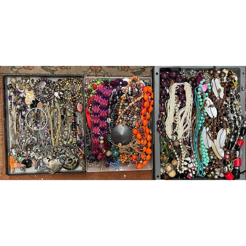 571 - THREE TRAYS OF COSTUME JEWELLERY