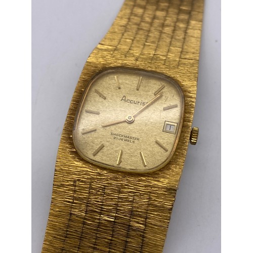 560 - ACCURIST 21 JEWELL WRISTWATCH ON BARK EFFECT GOLD PLATED STRAP