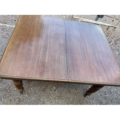 63 - EDWARDIAN EXTENDING DINING TABLE WITH CANTED EDGE ON CHUNKY TAPERED LEGS W105CM L123.5CM