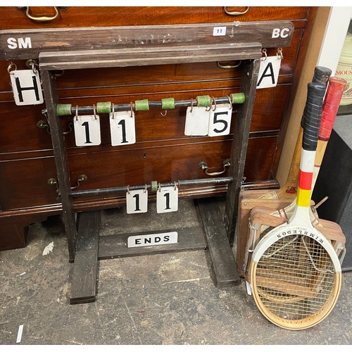 11 - LAWN BOWLS END SCOREMARKER BOARD AND THREE VINTAGE TENNIS RACKET