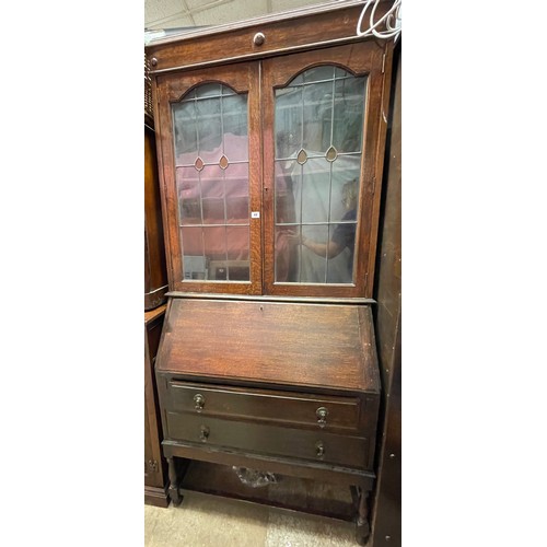 49 - 1920S OAK LEADED GLAZED BUREAU BOOKCASE