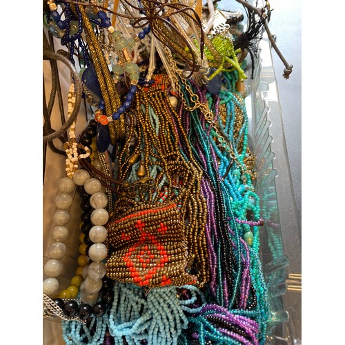 697 - BOX OF VARIOUS BEAD NECKLACES, PENDANTS, AND LEATHER STRAND PENDANTS