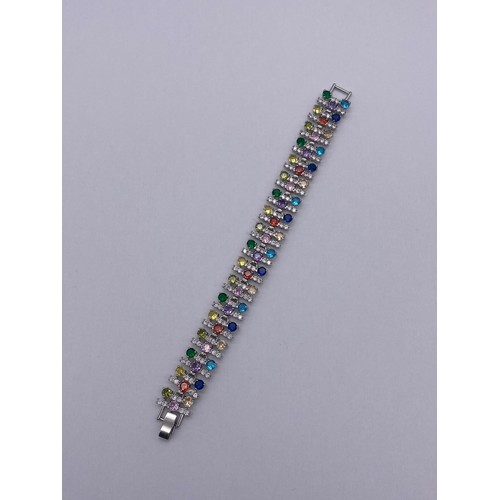 735 - BOXED MULTI STONE SET TENNIS BRACELET 17.5CM APPROX