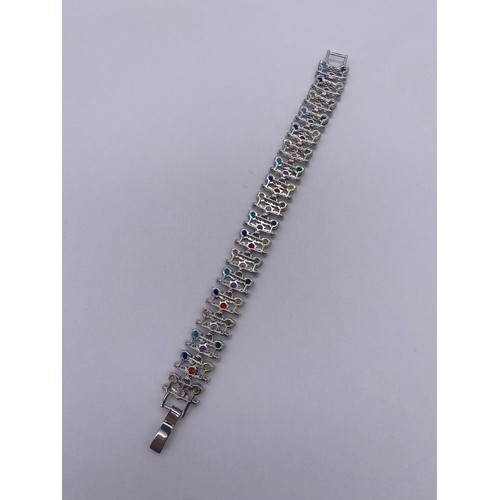 735 - BOXED MULTI STONE SET TENNIS BRACELET 17.5CM APPROX