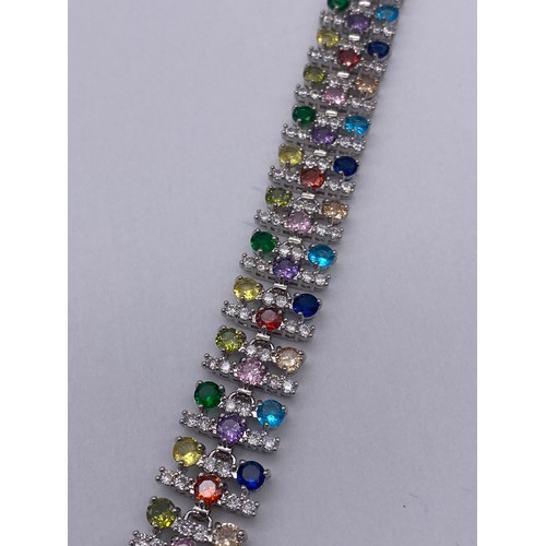 735 - BOXED MULTI STONE SET TENNIS BRACELET 17.5CM APPROX