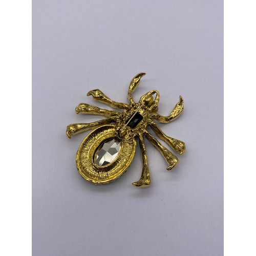 727 - LARGE MULTI COLOURED STONE SET SPIDER BROOCH