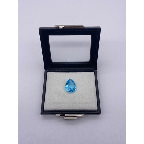 733 - NATURAL PEAR SHAPED FACET CUT BLUE TOPAZ 15.89CTS WITH GEMOLOGY CERTIFICATE