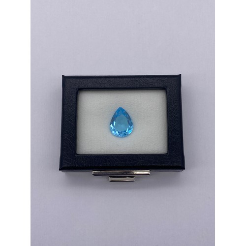 733 - NATURAL PEAR SHAPED FACET CUT BLUE TOPAZ 15.89CTS WITH GEMOLOGY CERTIFICATE