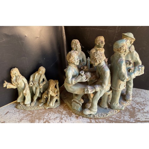 668 - TWO CONTEMPORARY POTTERY FIGURE GROUPS