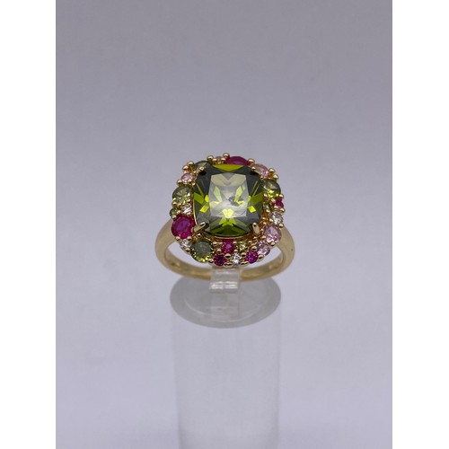 730 - SIMULATED PERIDOT AND MULTI STONE CLUSTER DRESS RING SIZE S